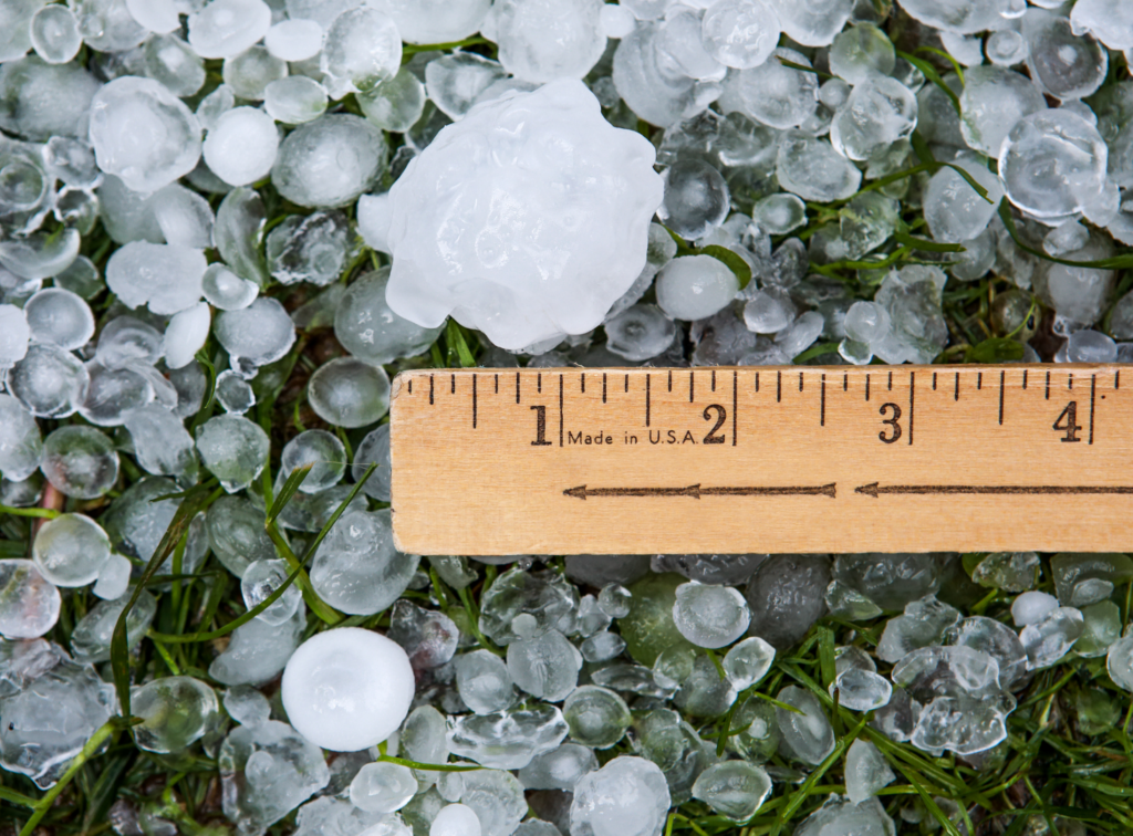An ice and a ruler measuring 1.5 inches